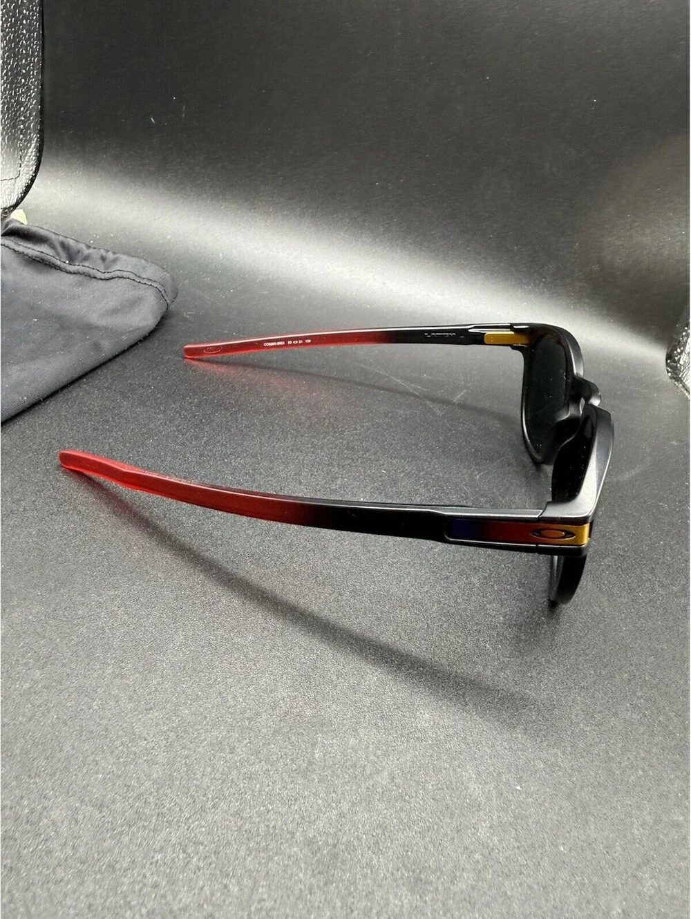Oakley Latch Ruby Fade/Prizm Black Iridium Polarized Lens OO9265-2653